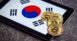 Golden bitcoins and South Korea flag. Digital cryptocurrency.